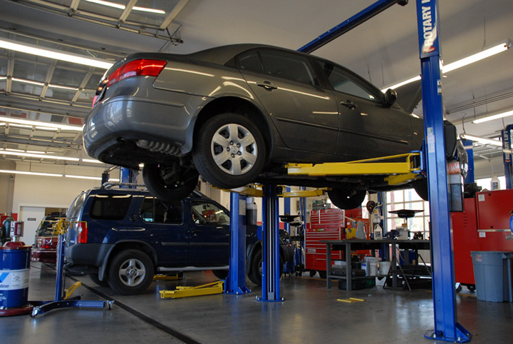 a car on a rack lift